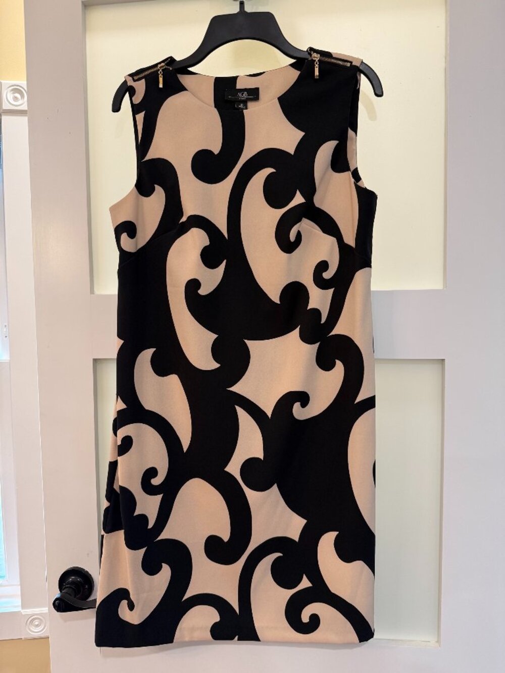 AGB - Sleeveless Shift Dress featuring a bold contrast print